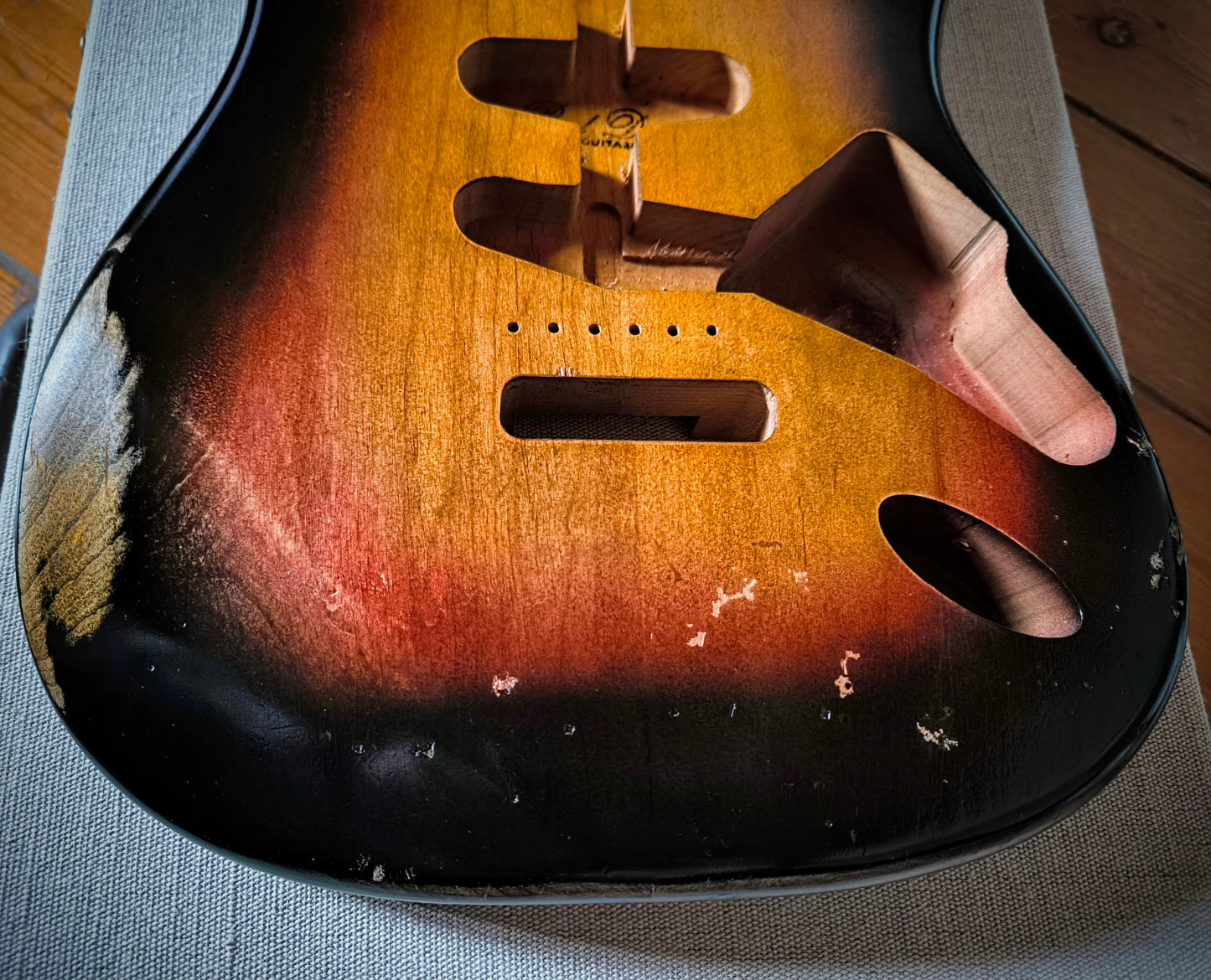 Cuerpo estilo Stratocaster®. 3TS. Aliso americano 2 piezas. Nitro. 1,8kg